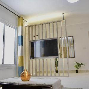 Luxe 2BR Garden Escape in Al Motamayez