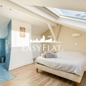 Lovely duplex under parisian roofs near Arc de Triomphe by Easyflat