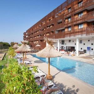 Cosy plage - Apt entièrement climatisé avec piscine partagée et garage clos