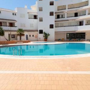 Apartment with one bedroom in Armacao de Pera with wonderful sea view shared pool furnished garden 100 m from the beach