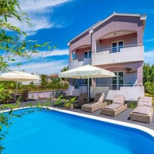 Nice home in Pasman w/ Outdoor swimming pool and 7 Bedrooms