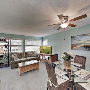 Walk to Beach! Sunlit Getaway with Pools & Tennis condo