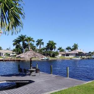 Canal-Front Getaway with Heated Pool & Dock home