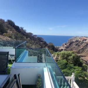 Apartment with 2 bedrooms in Mogan with wonderful sea view shared pool furnished garden