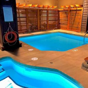 1BR + Loft | Tyndall Stone Lodge | Village Location | Pool & Hot Tub | Private Balcony