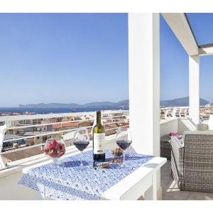 Alghero wonderful sea view penthouse ideal for 45 people