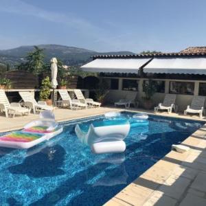 House with 2 bedrooms in Grasse with wonderful mountain view shared pool enclosed garden 13 km from the beach