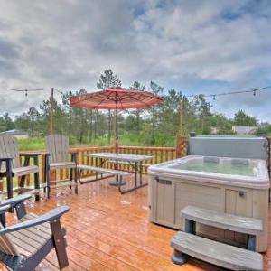 Rustic Benezette Cabin with Porch Hot Tub and Fire Pit