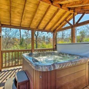 Cozy Broken Bow Cabin with Jacuzzi Fire Pit and Porch!