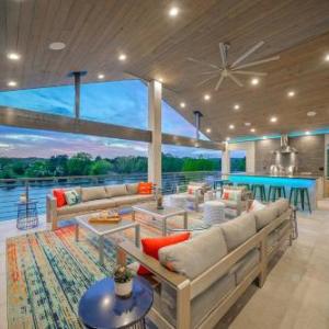 Lakefront Smart Home with Luxe Multi-Level Deck!