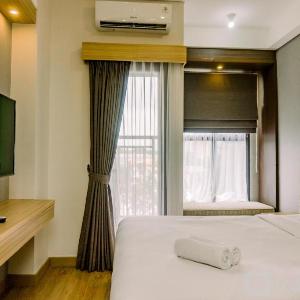 MinimalisWarm Studio Transpark Bintaro By Travelio