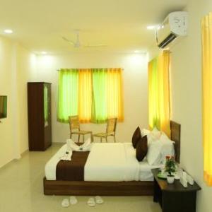 Green Tree Hotel-Near VFS Global and Ramee Mall