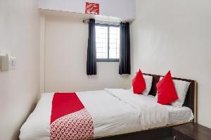 OYO Flagship 75731 Hotel Om Sai Lodging, Vagholi