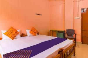 SPOT ON 63084 New Mubarak Tourist Home, Kollam