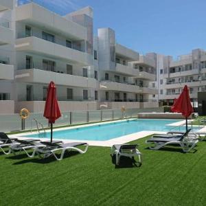 38 - Modern 2 bed apartment in Urb. Aqua with pool views. Close to the beach and town center