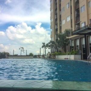 Best Price 1BR Apartment at The Oasis Cikarang By Travelio