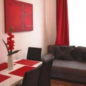 Vibrant Red Apartment by Guestia I contactless Check-In