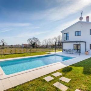 Awesome home in Marcana with Outdoor swimming pool and 4 Bedrooms