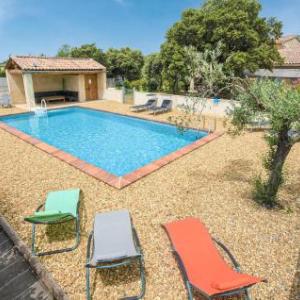 Amazing home in Mazan with Outdoor swimming pool and 4 Bedrooms