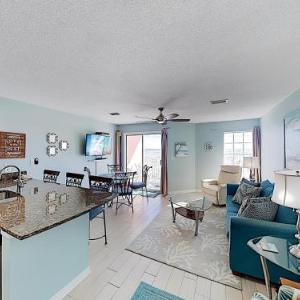New Listing! Coastal Gem with Pool 1 Block to Beach condo