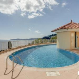 Panoramic view swimming pool and parking space