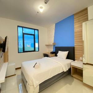 Smart Studio Room Semi Apartment at The Lodge Paskal near BINUS University By Travelio