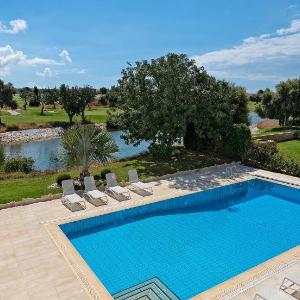 Luxury Modern Villa Poseidon - private pool golf course views roof terrace. Aphrodite Hills Resort