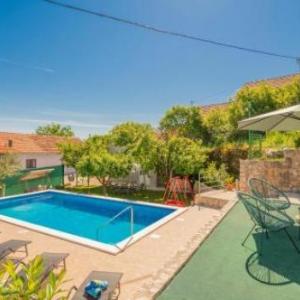 Beautiful home in Runovic with Outdoor swimming pool WiFi and 3 Bedrooms