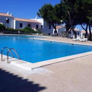 Apartment with 2 bedrooms in Arenal d'en Castell with shared pool terrace and WiFi