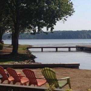Relax on our large porches with spectacular lakefront views at Westover Cottage