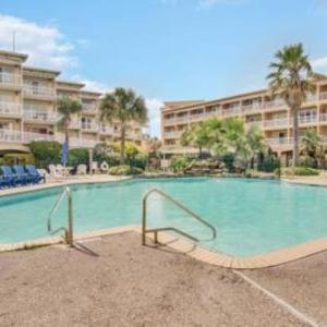 Beach Condo with Pools and View