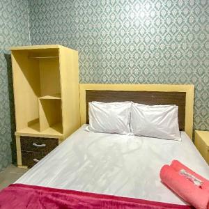 Tini's Guest House Malang Mitra RedDoorz