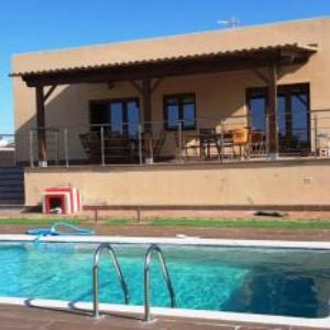 Chalet con piscina privada vistas campo golf