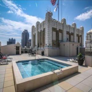 Jacuzzi in the sky Luxe 2BR condo with parking by CozySuites