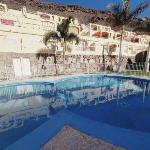 Apartment above the swimming pool with mountain views Mogán