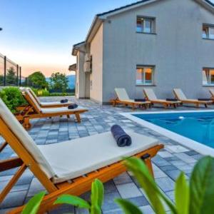 Beautiful home in Kosute with Outdoor swimming pool Sauna and 4 Bedrooms