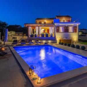 Amazing home in Biograd na moru with Outdoor swimming pool and 5 Bedrooms