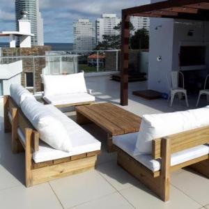 Estudio con parrillero y vista al mar