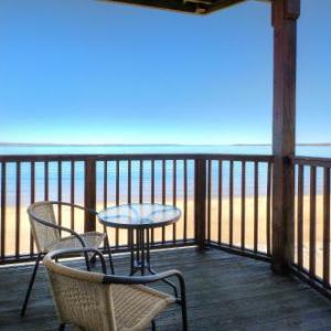 Beachside 216 with Pool Hot Tub and Private Deck Overlooking East Bay