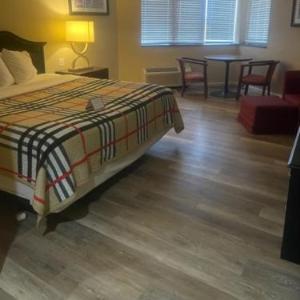 Apm Inn & Suites