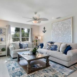 Gorgeous Fresh Florida Coastal Renovation Manor Steps to the Beach!