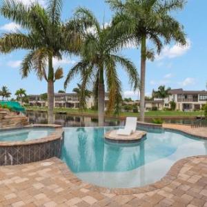 Stunning Waterfront Villa in Cape Coral with Lagoon Style Pool Spa and Boat Lift