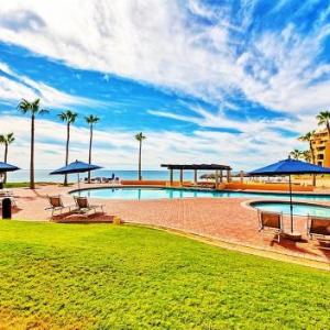 Ground Floor 1BR Beachfront - Steps to Pool - Princesa E104 - BeachBumCondos