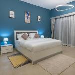 Trinity Holiday Homes - Spacious Modern Living 1BR & 2BR Unique Apartment Dubai 