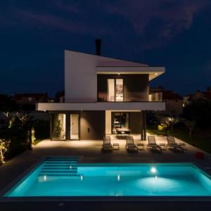Villa Arestea near Pula with 35 m2 heated pool sea view wellness & kids playground
