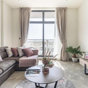 Bright and Unique 2BR Apartment Near DWC Airport!