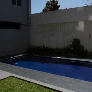 Cozy Modern and Centric Apartment with pool and gym