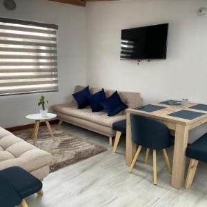 PUERTA DE LA VILLA Apartamentos y Habitaciones