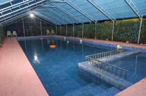 The Green Retreat by Spicy Mango, Panvel