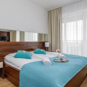 Atrium Apartment Spa & Gym 150m to the Beach Sarbinowo by Noclegi Renters